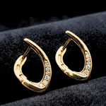 Load image into Gallery viewer, 18K Gold Filled Leaf Shaped Huggie Earrings with CZ