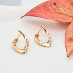 Load image into Gallery viewer, 18K Gold Filled Leaf Shaped Huggie Earrings with CZ