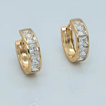 Load image into Gallery viewer, Gold Toned Diamond Huggies Hoop Earrings
